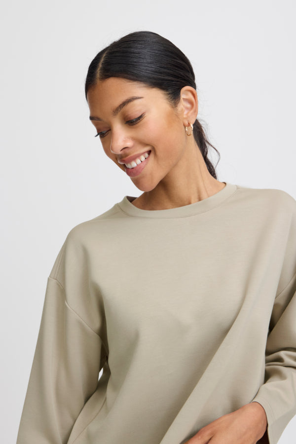 Byoung Bypusti Long sleeve top in String